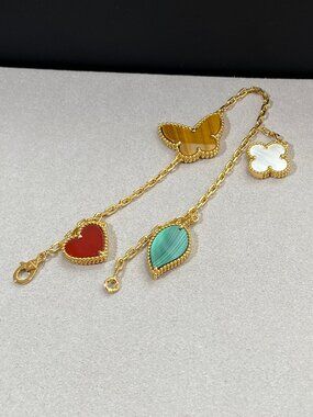 Van Cleef & Arpels's Elegant Lucky Alhambra Inspired Charm Bracelet